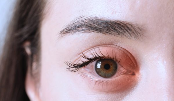 A close-up shot of one eye of a woman.